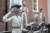 Photograph of Nek Chands sculptures of 5 people made of concrete and ceramic, displayed in the Pallant Gallery Courtyard