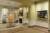 Interior of a Queen Anne townhouse with period fittings including a fireplace. Landscape paintings of the Australian outback by Sidney Nolan are hanging on the walls. In the centre of the room is an orange leotard dotted with whie handprints in a glass case.