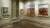 Interior of a Queen Anne townhouse with period fittings and two landscape paintings by Sidney Nolan hanging on the wall.