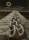 Photomontage by Edith Rimmington depicting two heavy chains on a wooden pier stretching out towards the horizon on a calm sea. A snake coils its way onto the chainlinks from the left side.