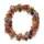 Photograph showing knitted festive baked goods including mince pies and gingerbread men shaped into a wreath.