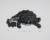 A black and white linocut print of a tortoise side on. The tortoise is eating a lettuce leaf. White background.