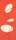 A long thin card with three cream coloured shapes against a red background. A thin straight line bisects all three vertically, as do two other curved lines.
