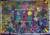 An abstract pattern featuring multicolpoured dominoes and other geometric shapes.