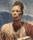 Portrait of man staring ahead in robes