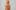 Wooden sculpture of man with rocket