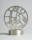 Metal sculpture of a disk with geometric shapes within it