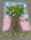 Photograph of a tree made from twigs and sand on a tarmac floor