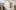 Photograph of a model art gallery in the shape of Pallant House with blurred people around it