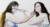 Two women face each other. Their arms extend to touch the other's face with a paint brush. Their expressions are neutral and their heads are turned toward the the viewer.
